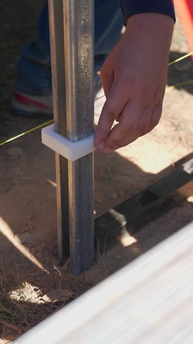 C-POST driven and aligned with ornamental fence.